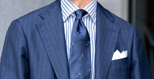 Blue suit striped shirt and necktie