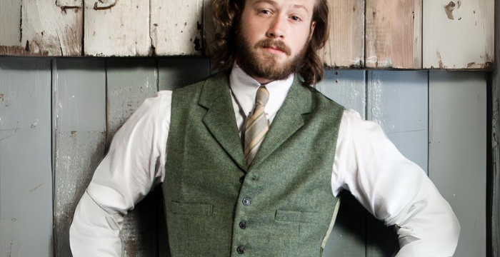Men in green waistcoat