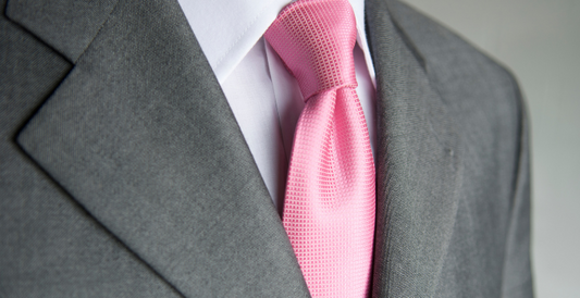Light Grey Suit And Pink Necktie