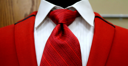 red suit blazer white dress shirt and red men's tie