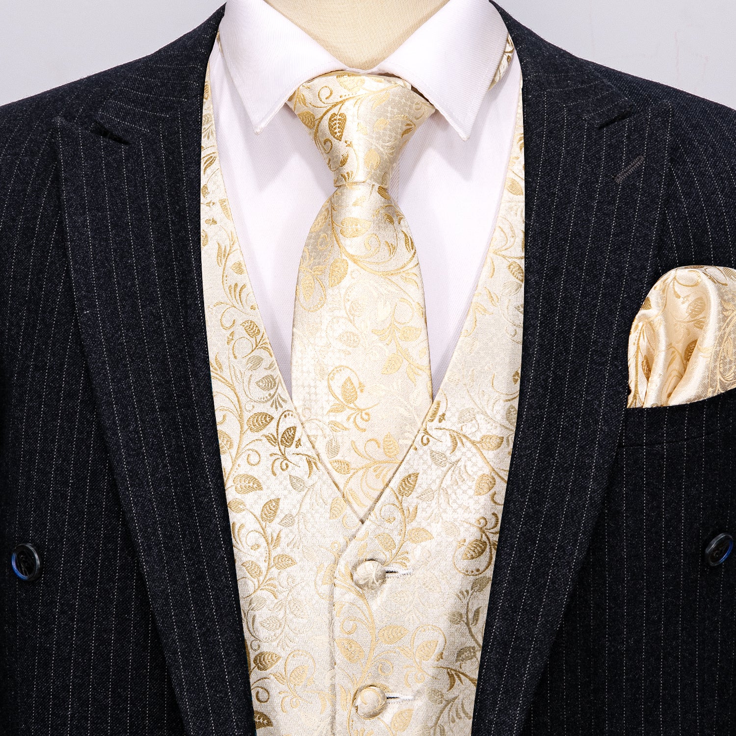gold vest and bow tie