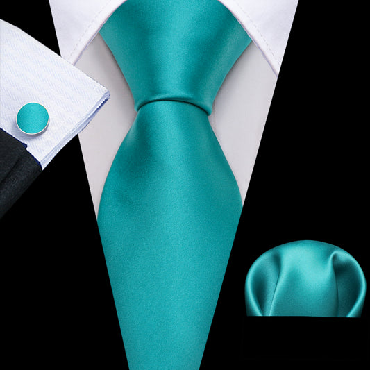 Blue Green necktie with black suit blazer and white dress shirt sky blue tie