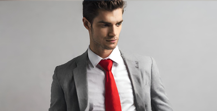 A Man Wearing a Red Necktie