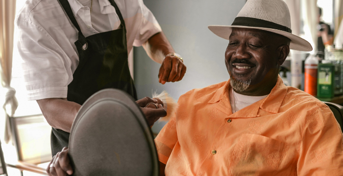 A men wearing a orange shirt