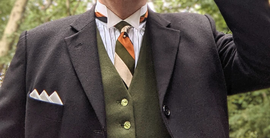 men wearing green waistcoat