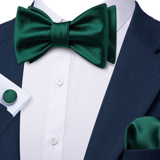 Blue suit white shirt formal dark green bow tie 