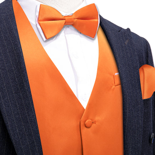 orange vest burnt orange bow tie black tux with orange vest