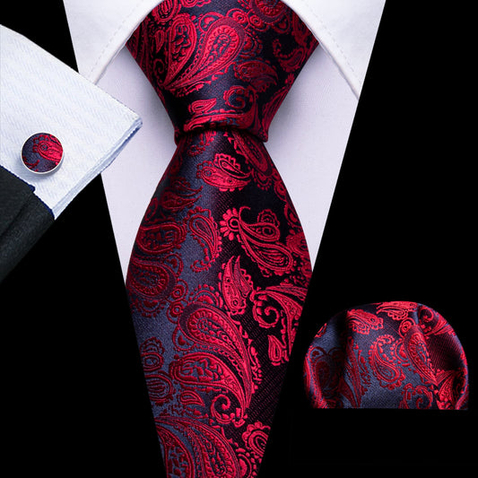 Mens black suit red tie wine colored tie red tie flowers